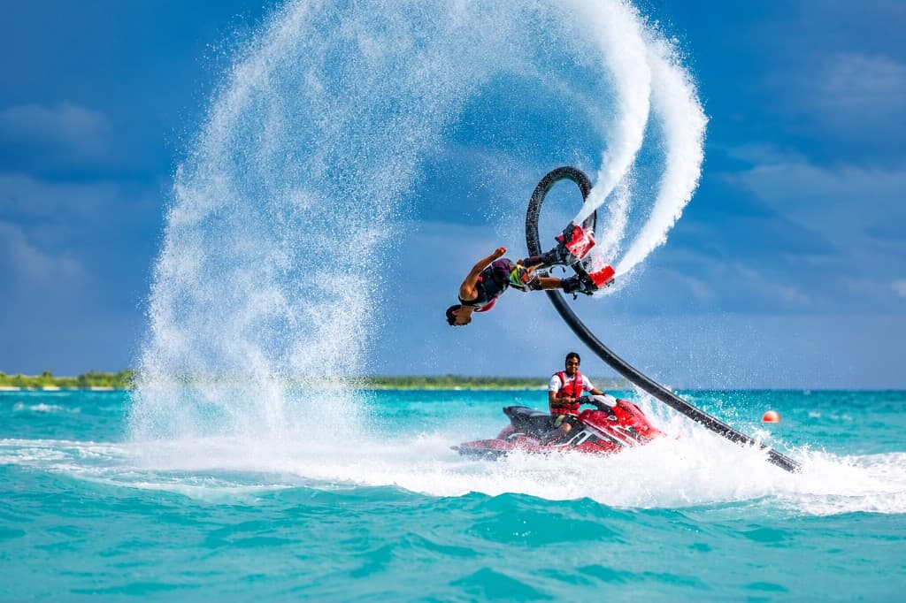 Flyboard and jet ski on turquoise water at Bangalore Water Sports